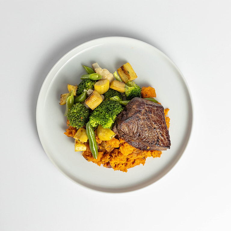 Grass-Fed Steak with Sweet Potatoes and Mixed Vegetables