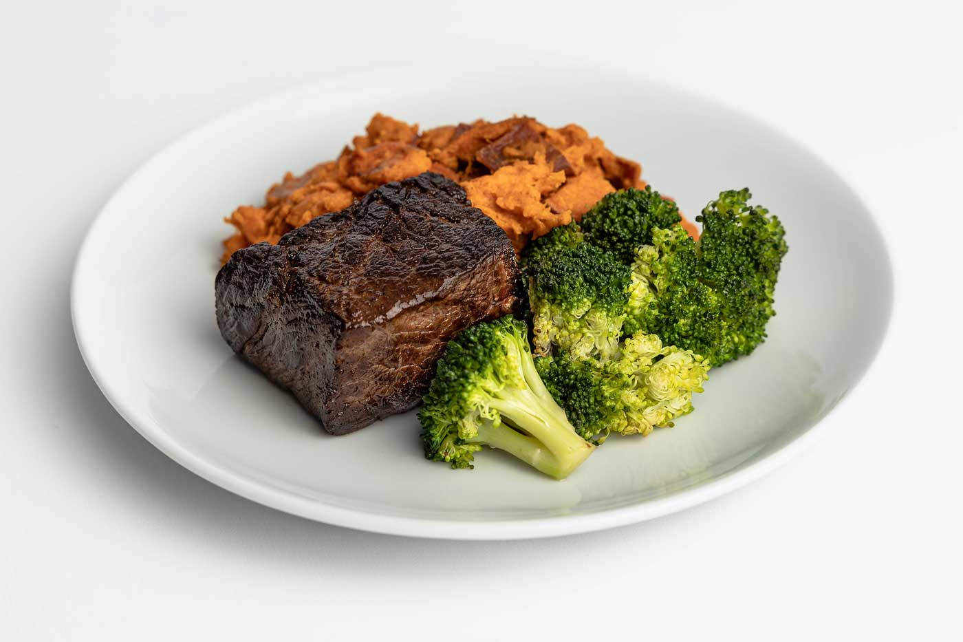 Paleo Meal Delivery Grass-Fed Steak with Mashed Sweet Potatoes and Broccoli