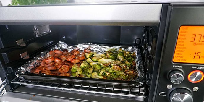 Cook sausage and brussels sprouts